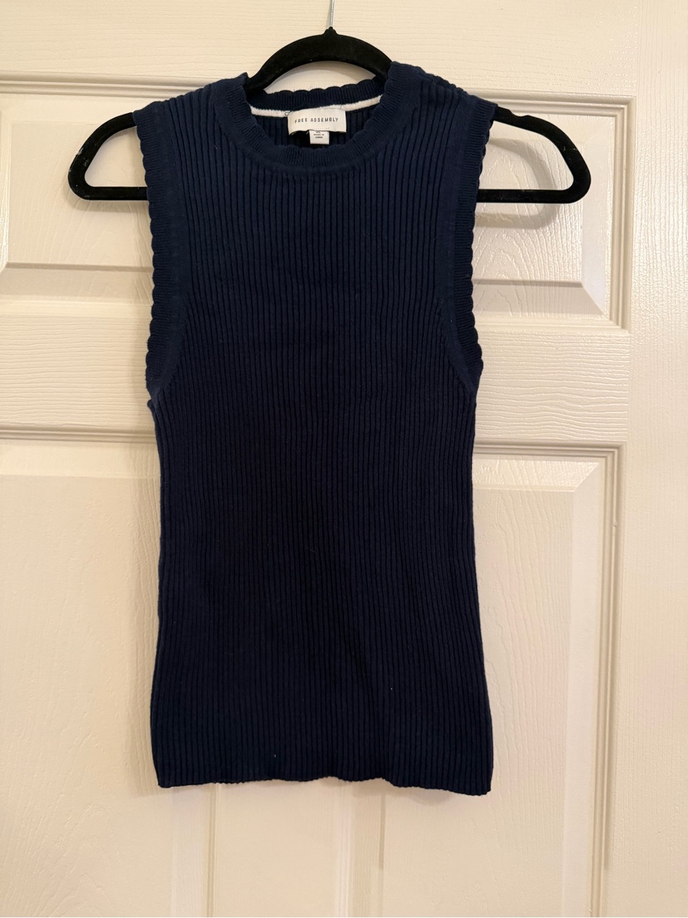 Navy Ribbed Crewneck Sleeveless Top with scalloped sleeves and neck